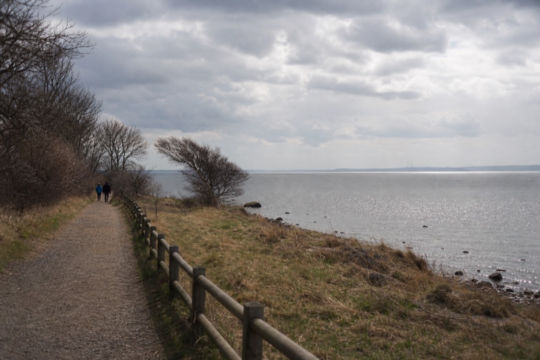 Louisiana Museum galleries opening onto a sculpture garden above the Oresund coast